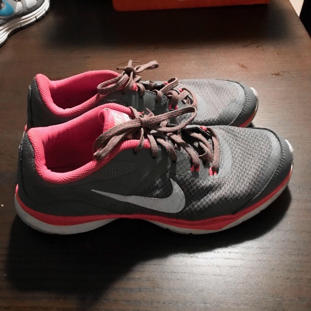 NIKE pink athletic running shoes